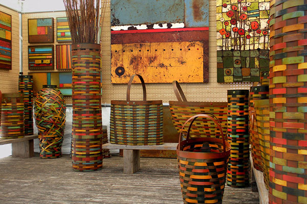 Oslapas art booth showing woven metal pieces
