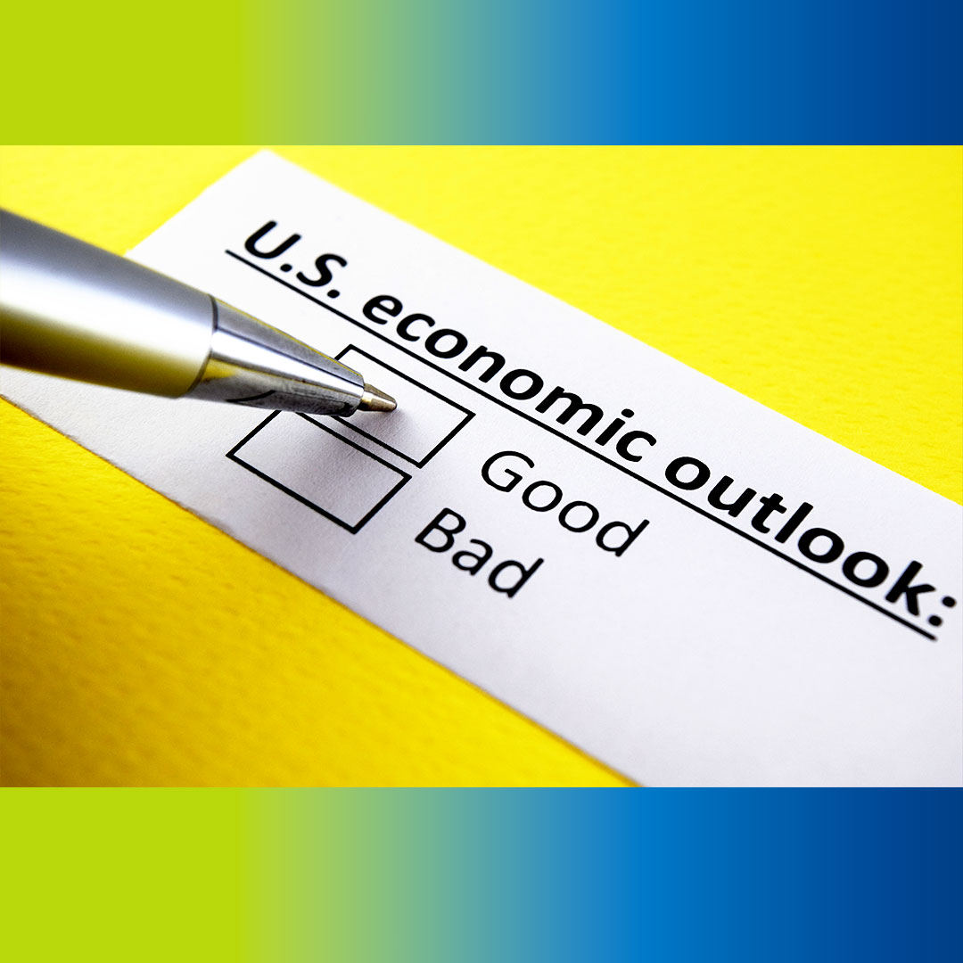 Ballpoint pen marking a box on a US economic outlook survey form