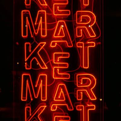 Red neon market sign