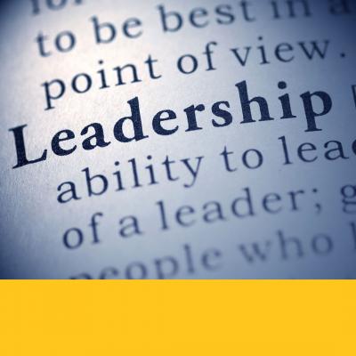 Close-up of dictionary definition of the word leadership