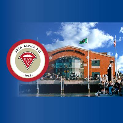 Brick and glass exterior of Bellingham Cruise Terminal with flag poles and people standing near building and logos superimposed