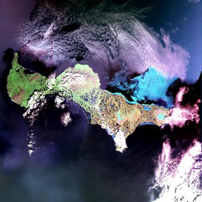 Vividly colored aerial view of St. Lawrence Island taken by a NASA satellite.
